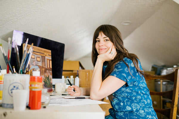 portrait of artist Michelle Christensen and creator of My Little Belleville in her studio