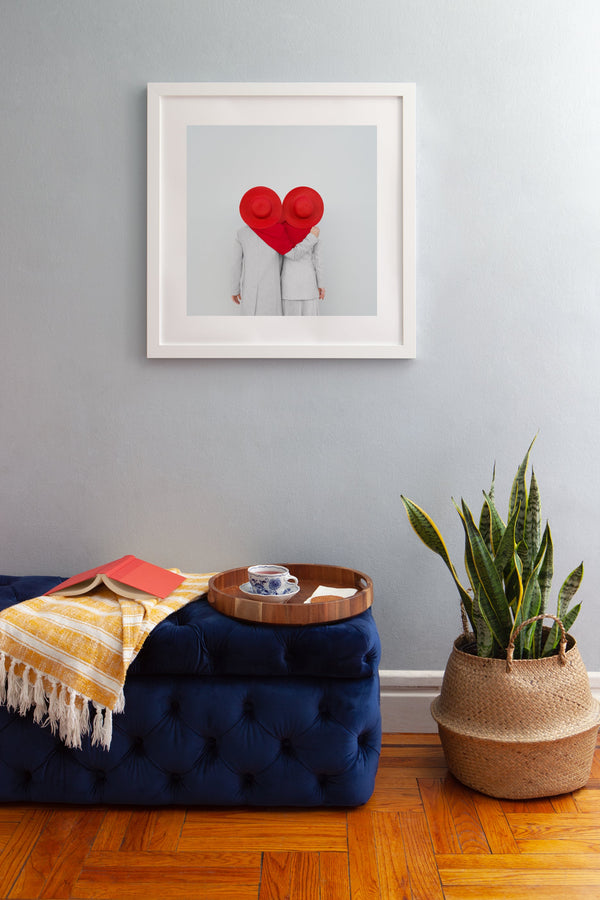 Red wall art in boho apartment