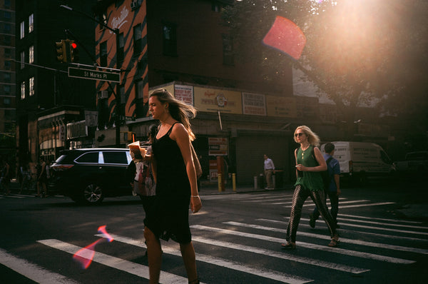 Woman crosses street in New York City